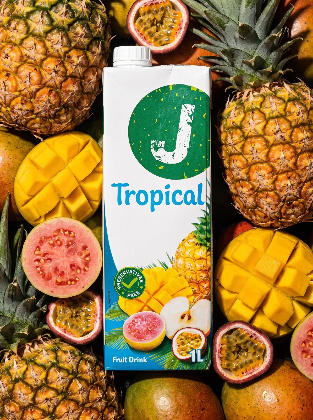 J Tropical — A fruit drink shown in its natural habitat